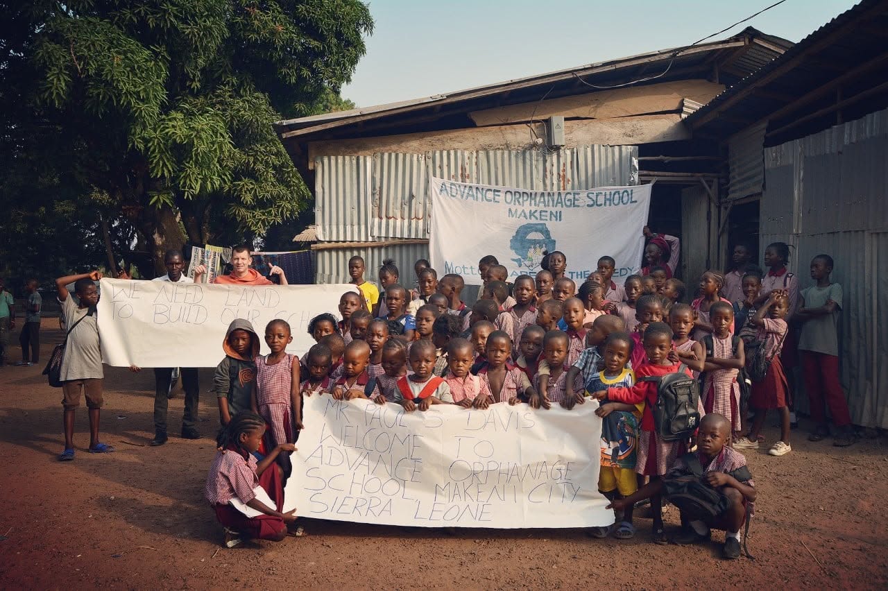 Children gathered outside their school